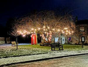 An image of The Green at Christmas, Hunsworth, West Yorkshire by Sophie Ransome Photography