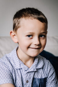 A portrait of a boy from a family session taken by Sophie Ransome Lifestyle Photographer