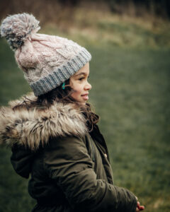 A young girl out on a walk during an Unscritped Photoshoot by Sophie Ransome Lifestyle Photographer