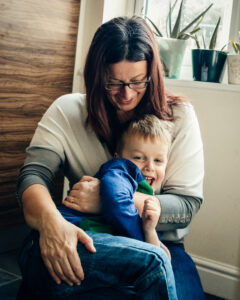Mum and son play during their unscripted photoshoot with Sophie Ransome Lifestyle Photographer