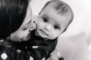 Black and white image of Mum and Baby , family portraiture by Sophie Ransome Lifestyle Photographer