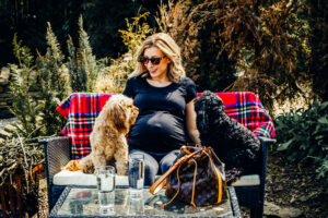 Mum to be during and her dogs, marternity photography by Sophie Ransome Lifestyle Photographer
