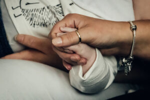 Holding hands. Newborn Image by Sophie Ransome Lifestyle Photographer