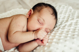Photo of a new born baby girl by Sophie Ransome Lifestyle Photographer